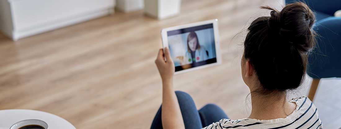 patient meeting with therapist via computer